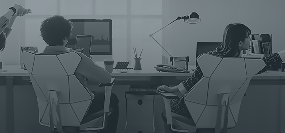 Professionals working in a technology-focused office